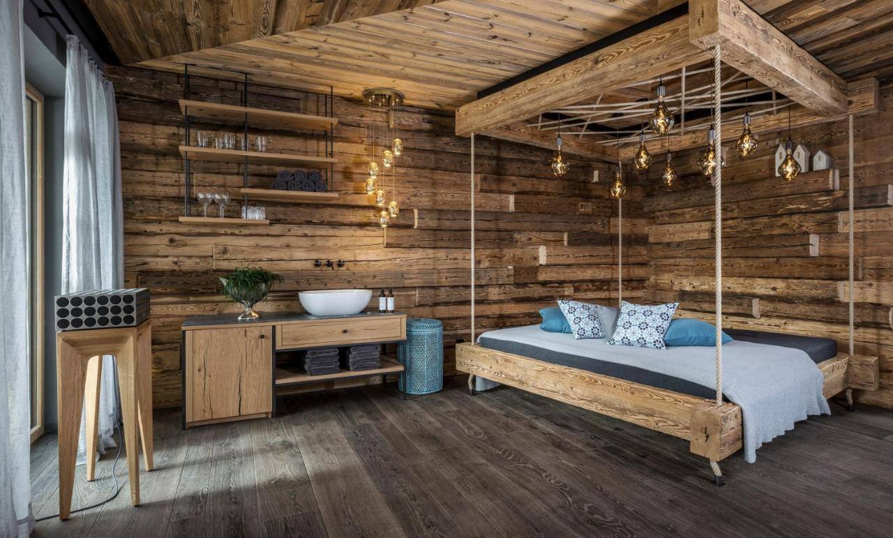 Chalet Gipfelkreuzliebe Schlafzimmer Suite Holzdesign