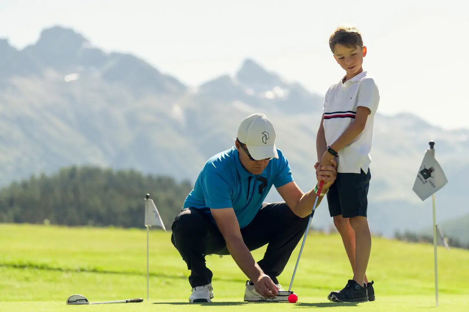 kulm-hotel-st.moritz-schweiz-golf-aktivitaten-familienspass-luxus-reisen-kinder-familie-the-family-project